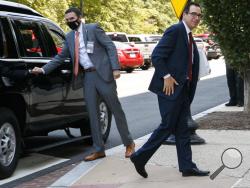 Treasury Secretary Steven Mnuchin arrives for continued negotiations ahead of a meeting, Wednesday, Aug. 5, 2020, on Capitol Hill in Washington. (AP Photo/Jacquelyn Martin)