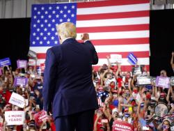 President Donald Trump arrives to speak at a rally at Xtreme Manufacturing, Sunday, Sept. 13, 2020, in Henderson, Nev. (AP Photo/Andrew Harnik)