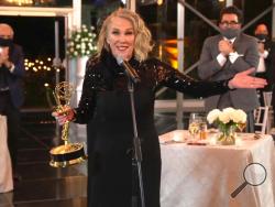 In this video grab captured on Sept. 20, 2020, courtesy of the Academy of Television Arts & Sciences and ABC Entertainment, Catherine O'Hara accepts the award for outstanding lead actress in a comedy series for "Schitt's Creek" during the 72nd Emmy Awards broadcast. (The Television Academy and ABC Entertainment via AP)