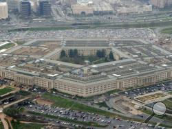 FILE - This March 27, 2008, file photo shows the Pentagon in Washington. The specter of election chaos in the United States is raising questions about whether voting, vote-counting or the post-vote reaction could become so chaotic that the military would intervene. (AP Photo/Charles Dharapak, File)