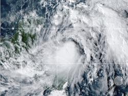 This satellite image provided by the National Oceanic and Atmospheric Administration shows Tropical Storm Zeta, Sunday, Oct. 25, 2020, at 2110 GMT (5:10 p.m. ET). (NOAA/NESDIS/STAR via AP)