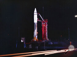 FILE - This Sept. 20, 1966 photo provided by the San Diego Air and Space Museum shows an Atlas Centaur 7 rocket on the launchpad at Cape Canaveral, Fla. A mysterious object temporarily orbiting Earth is the Centaur upper stage of this 54-year-old rocket, not an asteroid after all, astronomers confirmed Wednesday, Dec. 2, 2020. Observations by a telescope in Hawaii clinched its identity, according to NASA's Jet Propulsion Laboratory in Pasadena, California. (Convair/General Dynamics Astronautics Atlas Negati