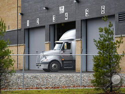 A truck is shown at the Pfizer Global Supply Kalamazoo manufacturing plant in Portage, Mich., Saturday, Dec. 12, 2020. (AP Photo/Paul Sancya)