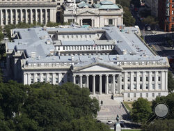 FILE - The U.S. Treasury Department building viewed from the Washington Monument, Wednesday, Sept. 18, 2019, in Washington. Hackers got into computers at the U.S. Treasury Department and possibly other federal agencies, touching off a government response involving the National Security Council. Security Council spokesperson John Ullyot said Sunday, Dec. 13, 2020 that the government is aware of reports about the hacks. (AP Photo/Patrick Semansky, file)