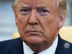 FILE - In this Jan. 27, 2020, file phoot President Donald Trump listens during a meeting with Israeli Prime Minister Benjamin Netanyahu in the Oval Office of the White House in Washington. The most improbable of presidents, Donald Trump reshaped the office and shattered its centuries-old norms and traditions while dominating the national discourse like no one before. (AP Photo/ Evan Vucci)