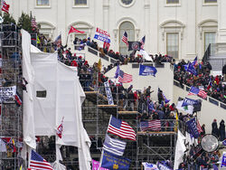 Trump supporters gather outside the Capitol, Wednesday, Jan. 6, 2021, in Washington. (AP Photo/John Minchillo)