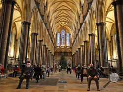 People sit and relax after receiving their Pfizer-BioNTech vaccination at Salisbury Cathedral in Salisbury, England, Wednesday, Jan. 20, 2021. Salisbury Cathedral opened its doors for the second time as a venue for the Sarum South Primary Care Network COVID-19 Local Vaccination Service. (AP Photo/Frank Augstein)