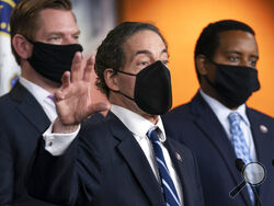 Lead House impeachment manager Rep. Jamie Raskin, D-Md., with impeachment managers Rep. Eric Swalwell, D-Calif., and Rep. Joe Neguse, D-Colo., right, speaks to members of the media during a news conference on Capitol Hill in Washington, Saturday, Feb. 13, 2021, after the U.S. Senate voted to acquit former President Donald Trump, ending the impeachment trial. (AP Photo/Manuel Balce Ceneta)