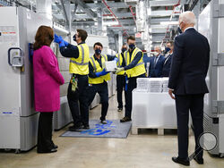 FILE - In this Feb. 19, 2021, file photo President Joe Biden, right, and Michigan Gov. Gretchen Whitmer, left, tour a Pfizer manufacturing site in Portage, Mich. (AP Photo/Evan Vucci, File)