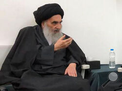 FILE - This March, 13, 2019 handout file photo from the office of Grand Ayatollah Ali al-Sistani, shows senior Shiite cleric Grand Ayatollah Ali al-Sistani in the southern Iraqi city of Najaf. On Saturday, March 6, 2021, Pope Francis will visit the 90-year-old Grand Ayatollah who is revered by many Shiites worldwide and whose words hold powerful influence in Iraq and beyond. The pontiff and ayatollah will meet in al-Sistani’s modest home in the Iraqi city of Najaf. (Office of Grand Ayatollah Ali al-Sistani,