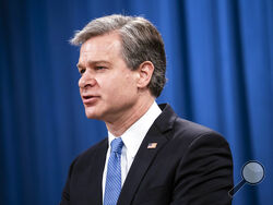 FILE - In this Oct. 28, 2020, file photo, FBI Director Christopher Wray speaks during a virtual news conference at the Department of Justice in Washington. Wray is set to testify for the first time since the deadly Jan. 6 deadly riot at the U.S. Capitol. (Sarah Silbiger/Pool via AP)