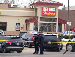 Police work on the scene outside of a King Soopers grocery store where a shooting took place Monday, March 22, 2021, in Boulder, Colo. (AP Photo/David Zalubowski)