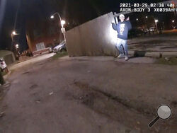 This image from Chicago Police Department body cam video shows the moment before Chicago Police officer Eric Stillman fatally shot Adam Toledo, 13, on March 29, 2021, in Chicago. (Chicago Police Department via AP)