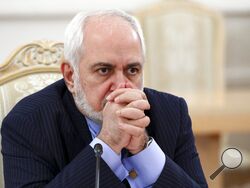 FILE - In this Jan. 26, 2021, file photo released by the Russian Foreign Ministry Press Service, Iranian Foreign Minister Mohammad Javad Zarif listens during the talks in Moscow, Russia. A recording of Iran's foreign minister offering a blunt appraisal of diplomacy and the limits of power within the Islamic Republic has leaked out publicly, providing a rare look inside the country's theocracy. (Russian Foreign Ministry Press Service via AP, File)