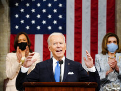 Vice President Kamala Harris, and House Speaker Nancy Pelosi of Calif., stand and applaud as President Joe Biden addresses a joint session of Congress, Wednesday, April 28, 2021, in the House Chamber at the U.S. Capitol in Washington. (Melina Mara/The Washington Post via AP, Pool)