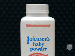 FILE - In this April 15, 2011, file photo, a bottle of Johnson's baby powder is displayed. Johnson & Johnson is asking for Supreme Court review of a $2 billion verdict in favor of women who claim they developed ovarian cancer from using the company's talc products. (AP Photo/Jeff Chiu, File)
