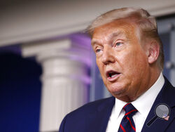 FILE - In this Tuesday, Aug. 4, 2020 file photo, President Donald Trump speaks during a briefing with reporters in the James Brady Press Briefing Room of the White House, in Washington. Facebook plans to end a contentious policy championed by CEO Mark Zuckerberg that exempted politicians from certain moderation rules on its site, according to several news reports. The company's rationale for that policy held that the speech of political leaders is inherently newsworthy and in the public interest even if it 