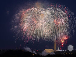 FILE - In this Saturday, July 4, 2020, file photo, Fourth of July fireworks explode over the Lincoln Memorial, the Washington Monument and the U.S. Capitol along the National Mall in Washington. President Joe Biden wants to imbue Independence Day with new meaning in 2021 by encouraging nationwide celebrations to mark the country’s effective return to normalcy after 16 months of pandemic disruption. The White House says the National Mall in Washington will host the traditional fireworks ceremony and it's enc