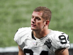 FILE - In this Nov. 29, 2020, file photo, Las Vegas Raiders defensive end Carl Nassib leaves the field after an NFL football game against the Atlanta Falcons in Atlanta. Nassib on Monday, June 21, 2021, became the first active NFL player to come out as gay. Nassib announced the news on Instagram, saying he was not doing it for the attention but because “I just think that representation and visibility are so important.” (AP Photo/John Bazemore, File)