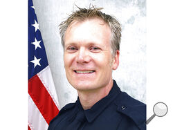 In this undated photo provided by the Arvada Police Department shows Officer Gordon Beesley. Beesley was working patrol, Monday, June 21, 2021, when police say he was hit by gunfire shortly after a report of a "suspicious incident" near the library in Arvada, Colo. (Arvada Police Department via AP)