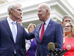 President Joe Biden speaks with Sen. Rob Portman, R-Ohio, and other bipartisan group of senators, Thursday June 24, 2021, outside the White House in Washington. Biden invited members of the group of 21 Republican and Democratic senators to discuss the infrastructure plan. From left are Portman, Sen. Bill Cassidy, R-La., Sen. Lisa Murkowski, R-Alaska, Biden, Sen, Joe Manchin, D-W.Va., rear, and Sen. Kyrsten Sinema. (AP Photo/Jacquelyn Martin)