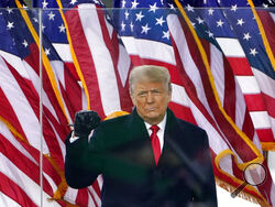 FILE - In this Jan. 6, 2021, file photo, then-President Donald Trump gestures as he arrives to speak at a rally in Washington. Trump will return to the rally stage this weekend. He's holding his first campaign-style event since leaving the White House as he makes good on his pledge to exact revenge on those who voted for his historic second impeachment.(AP Photo/Jacquelyn Martin, File)