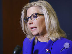 FILE - In this May 12, 2021, file photo Rep. Liz Cheney, R-Wyo., speaks to reporters in Washington. House Speaker Nancy Pelosi has named House Homeland Security Chairman Bennie Thompson as the head of a new select committee to investigate the Jan. 6 insurrection at the Capitol. She also picked Cheney as a member. (AP Photo/J. Scott Applewhite, File)