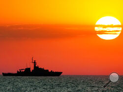 A view of the Britain's Royal Navy patrol ship OPV "Trent" in the Black Sea, Thursday late, July 8, 2021 during Sea Breeze 2021 maneuvers. Ukraine and NATO have conducted Black Sea drills involving dozens of warships in a two-week show of their strong defense ties and capability following a confrontation between Russia's military forces and a British destroyer off Crimea last month. (AP Photo/Efrem Lukatsky)