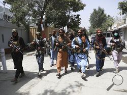 Taliban fighters patrol in the Wazir Akbar Khan neighborhood in the city of Kabul, Afghanistan, Wednesday, Aug. 18, 2021. The Taliban declared an "amnesty" across Afghanistan and urged women to join their government Tuesday, seeking to convince a wary population that they have changed a day after deadly chaos gripped the main airport as desperate crowds tried to flee the country. (AP Photo/Rahmat Gul)