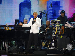 Barry Manilow performs at We Love NYC: The Homecoming Concert at The Great Lawn in Central Park on Saturday, Aug. 21, 2021, in New York. (Photo by Andy Kropa/Invision/AP)
