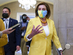 Speaker of the House Nancy Pelosi, D-Calif., leaves the chamber after urging advancement of the John Lewis Voting Rights Advancement Act, named for the late Georgia congressman who made the issue a defining one of his career, at the Capitol in Washington, Tuesday, Aug. 24, 2021. (AP Photo/J. Scott Applewhite)