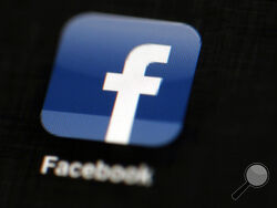 FILE - In this May 16, 2012, file photo, the Facebook logo is displayed on an iPad in Philadelphia. (AP Photo/Matt Rourke, File)