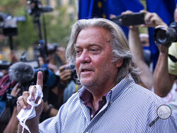 FILE - In this Aug. 20, 2020, file photo, President Donald Trump's former chief strategist Steve Bannon speaks with reporters in New York. A lawyer for Bannon says Bannon won’t comply with a congressional investigation into the Jan. 6 insurrection at the Capitol because President Donald Trump is asserting executive privilege to block demands for testimony and documents.(AP Photo/Eduardo Munoz Alvarez, File)