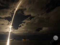 This photo released by NASA, shows a United Launch Alliance Atlas V rocket with the Lucy spacecraft aboard in this 2 minute and 30 second exposure photo as it launches from Space Launch Complex 41, Saturday, Oct. 16, 2021, at Cape Canaveral Space Force Station in Florida. Lucy will be the first spacecraft to study Jupiter's Trojan Asteroids. Like the mission's namesake – the fossilized human ancestor, "Lucy," whose skeleton provided unique insight into humanity's evolution – Lucy will revolutionize our know
