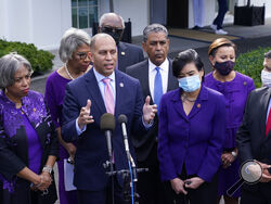 Rep. Hakeem Jeffries, D-N.Y., standing with other House Democrats, talks to reporters outside the West Wing of the White House in Washington, Tuesday, Oct. 26, 2021, following a meeting with President Joe Biden to work out details of the Biden administration's domestic agenda. (AP Photo/Susan Walsh)