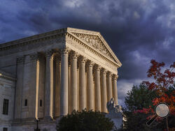 FILE - The Supreme Court is seen at dusk in Washington, Oct. 22, 2021. The Supreme Court is taking up challenges to a Texas law that has virtually ended abortion in the nation’s second largest state after six weeks of pregnancy. The justices are hearing arguments Monday, Nov. 1, in two cases over whether abortion providers or the Justice Department can mount federal court challenges to the law, which has an unusual enforcement scheme its defenders argue shield it from federal court review. (AP Photo/J. Scot