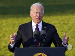 President Joe Biden speaks before signing the $1.2 trillion bipartisan infrastructure bill into law during a ceremony on the South Lawn of the White House in Washington, Monday, Nov. 15, 2021. The last time Joe Biden was in New Hampshire, he was being trounced in the state’s 2020 Democratic presidential primary. On Tuesday, Biden returns to New Hampshire as president, eager to talk up his new $1 trillion infrastructure deal and what all that money can do for Americans. (AP Photo/Susan Walsh)