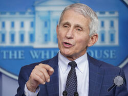 FILE - Dr. Anthony Fauci, director of the National Institute of Allergy and Infectious Diseases, speaks during the daily briefing at the White House in Washington, Wednesday, Dec. 1, 2021. U.S. health officials said Sunday, Dec. 5 that while the omicron variant of the coronavirus is rapidly spreading throughout the country, early indications suggest it may be less dangerous than delta, which continues to drive a surge of hospitalizations. President Joe Biden's chief medial adviser, Dr. Anthony Fauci, told C