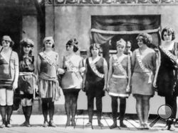 FILE - Contestants in the first Miss America pageant line up for the judges in Atlantic City, N.J., in September 1921. The competition is marking its 100th anniversary on Thursday, Dec. 16, 2021, having managed to maintain a complicated spot in American culture with a questionable relevancy. (AP Photo/File)