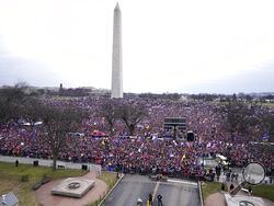 FILE - With the Washington Monument in the background, people attend a rally in support of President Donald Trump on Jan. 6, 2021, in Washington. Intelligence reports compiled by the U.S. Capitol Police in the days before last year's insurrection envisioned only an improbable or remote risk of violence, even as other assessments warned that crowds of potentially tens of thousands of pro-Trump demonstrators could converge in Washington to create a dangerous situation. (AP Photo/Jacquelyn Martin, File)