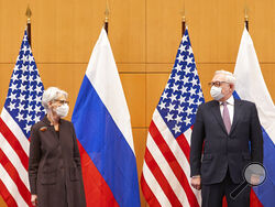 US Deputy Secretary of State Wendy Sherman, left, and Russian deputy foreign minister Sergei Ryabkov attend security talks at the United States Mission in Geneva, Switzerland, Monday, Jan. 10, 2022. (Denis Balibouse/Pool via AP)