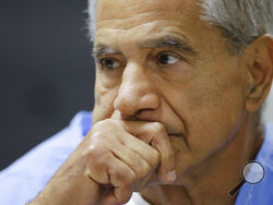 FILE - Sirhan Sirhan reacts during a parole hearing on Feb. 10, 2016, at the Richard J. Donovan Correctional Facility in San Diego. California Gov. Gavin Newsom on Thursday, Jan. 13, 2022, rejected releasing Robert F. Kennedy assassin Sirhan Sirhan from prison more than a half-century after the 1968 slaying left a deep wound during one of America’s darkest times. (AP Photo/Gregory Bull, Pool, File)