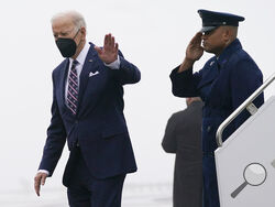 President Joe Biden waves as he steps off Air Force One upon arrival, at John F. Kennedy Airport, Thursday, Feb. 3, 2022, in the Queens Borough of New York. (AP Photo/Alex Brandon)