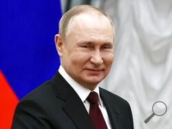 Russian President Vladimir Putin attends a ceremony to present the highest state awards in the Kremlin in Moscow, Russia, Wednesday, Feb. 2, 2022. At the core of the Ukraine crisis is a puzzle. Why would Putin push Europe to the brink of war to demand the West not do something that it has no plan to do anyway? Russia says NATO, the American-led alliance that has on its hands the biggest European crisis in decades, must never offer membership to Ukraine, which gained independence as the Soviet Union broke ap
