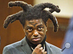 FILE - Rapper Kodak Black appears in court at the Florence County, South Carolina, courthouse in Florence, S.C., April 28, 2021. Los Angeles Police say four people were shot and wounded after a fight broke out outside a Los Angeles restaurant hosting a party that followed a Justin Bieber concert early morning Saturday, Feb. 12, 2022. Black is among several people involved in the brawl when shots rang out, sending everyone at the scene running for cover. Law enforcement sources told NBC News that Black, whos