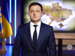 In this photo provided by the Ukrainian Presidential Press Office, Ukrainian President Volodymyr Zelenskyy addresses the nation on a live TV broadcast in Kyiv, Ukraine, Tuesday, Feb. 22, 2022. President Zelenskyy has told the nation that Ukraine is "not afraid of anyone or anything." He spoke during a chaotic day in which Russia appeared to be moving closer to an invasion, with President Vladimir Putin recognizing separatist regions of eastern Ukraine and then ordering forces there.(Ukrainian Presidential P