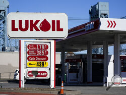 A Lukoil gas station sits in Newark, N.J., Thursday, March 3, 2022. Outraged by the invasion of Ukraine, the Newark City Council voted unanimously Wednesday to suspend the service stations’ operating licenses, citing Lukoil’s base in Moscow. In doing so, however, they may have predominantly been hurting Americans. (AP Photo/Seth Wenig)