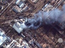 This satellite image provided by Maxar Technologies shows a closeup view of fires in an industrial area and nearby fields in southern Chernihiv, Ukraine, during the Russian invasion, Thursday, March 10, 2022. (Satellite image ©2022 Maxar Technologies via AP)