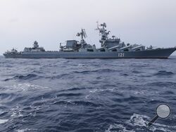 FILE - In this photo provided by the Russian Defense Ministry Press Service, Russian navy missile cruiser Moskva is on patrol in the Mediterranean Sea near the Syrian coast on Dec. 17, 2015. (Russian Defense Ministry Press Service via AP, File)