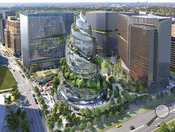 This artist rendering provided by Amazon shows the next phase of the company's headquarters redevelopment to be built in Arlington, Va. The Arlington county Board gave approval Saturday, April 23, 2022 to Amazon's plans to build a unique, helix-shaped tower as the centerpiece of its emerging second headquarters in northern Virginia.(NBBJ/Amazon via AP)